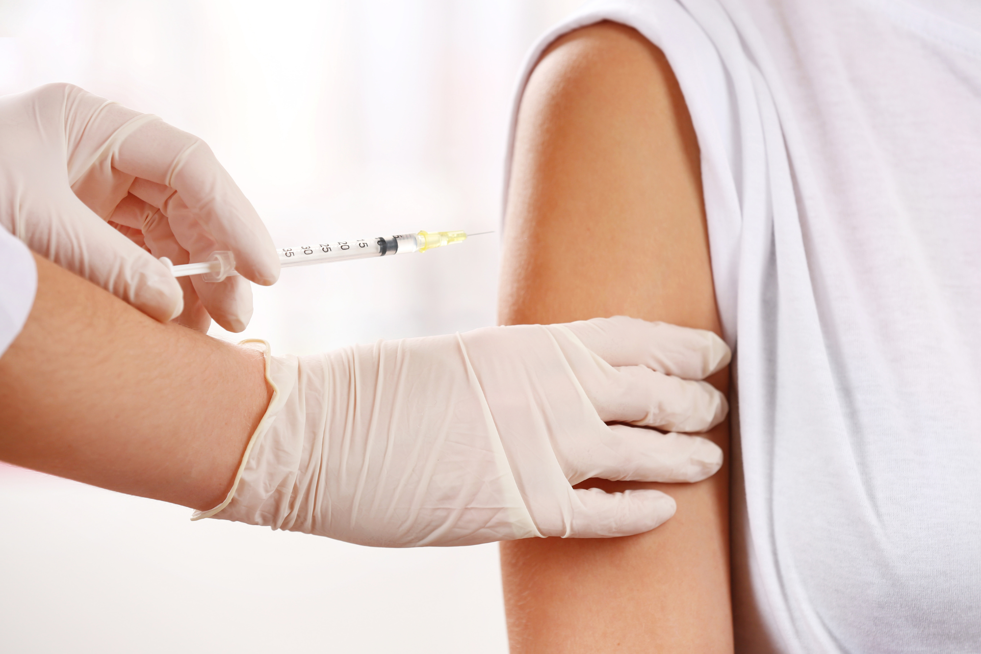 vitamin injection into upper arm